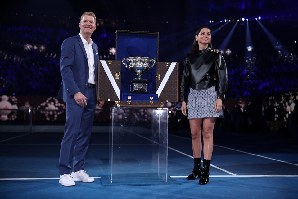 Ana de Armas and Jim Courier with a Louis Vuitton trophy trunk