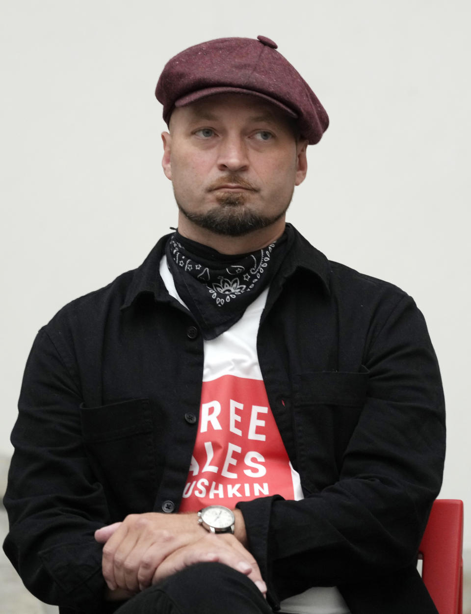 Jon Eirik Lundberg, the co-curator of a new exhibition at the Ujazdowski Castle Center for Contemporary Art in Warsaw, Poland, speaks at a news conference about a new exhibition in Warsaw, Poland, on Friday Aug. 27, 2021. The exhibition titled "Political Art" which opens Friday at the Polish state museum features the works of provocative artists in what organizers describe as a celebration of free speech. Some critics, however, accuse the organizers of the show of giving a platform to anti-Semitic and racist messages. (AP Photo/Czarek Sokolowski)