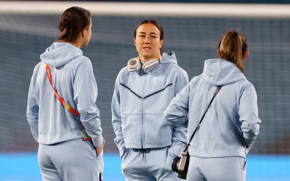 England's Lucy Bronze and teammates inside the stadium before the match