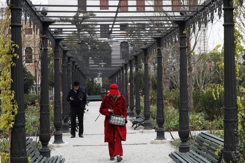 People visit the newly restored Royal Gardens in Venice, Italy, Tuesday, Dec. 17, 2019. Venice’s Royal Gardens were first envisioned by Napolean, flourished under Austrian Empress Sisi and were finally opened to the public by the Court of Savoy, until falling into disrepair in recent years. After an extensive restoration, the gardens reopened Tuesday as a symbol both of the lagoon city’s endurance and the necessity of public-private partnerships to care for Italy’s extensive cultural heritage. (AP Photo/Antonio Calanni)