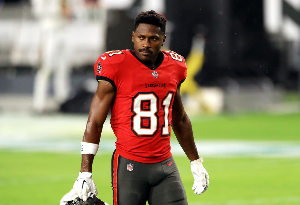 Antonio Brown on field in a buccaneers jersey