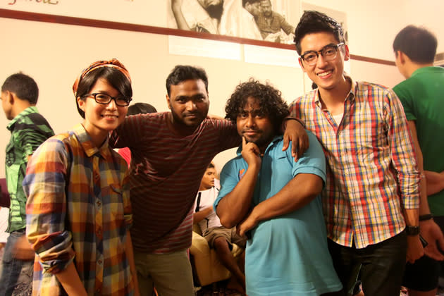 Lead vocalist Moxi Looi (left) and Guan Xian (right) pose with Osman and Jahangir. (Photo courtesy of Bernice Wong)