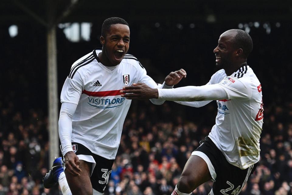 Sessegnon (L) celebrates scoring Fulham's third goal during the FA Cup fourth round match against Hull City at Craven Cottage (Glyn Kirk/AFP/Getty Images)