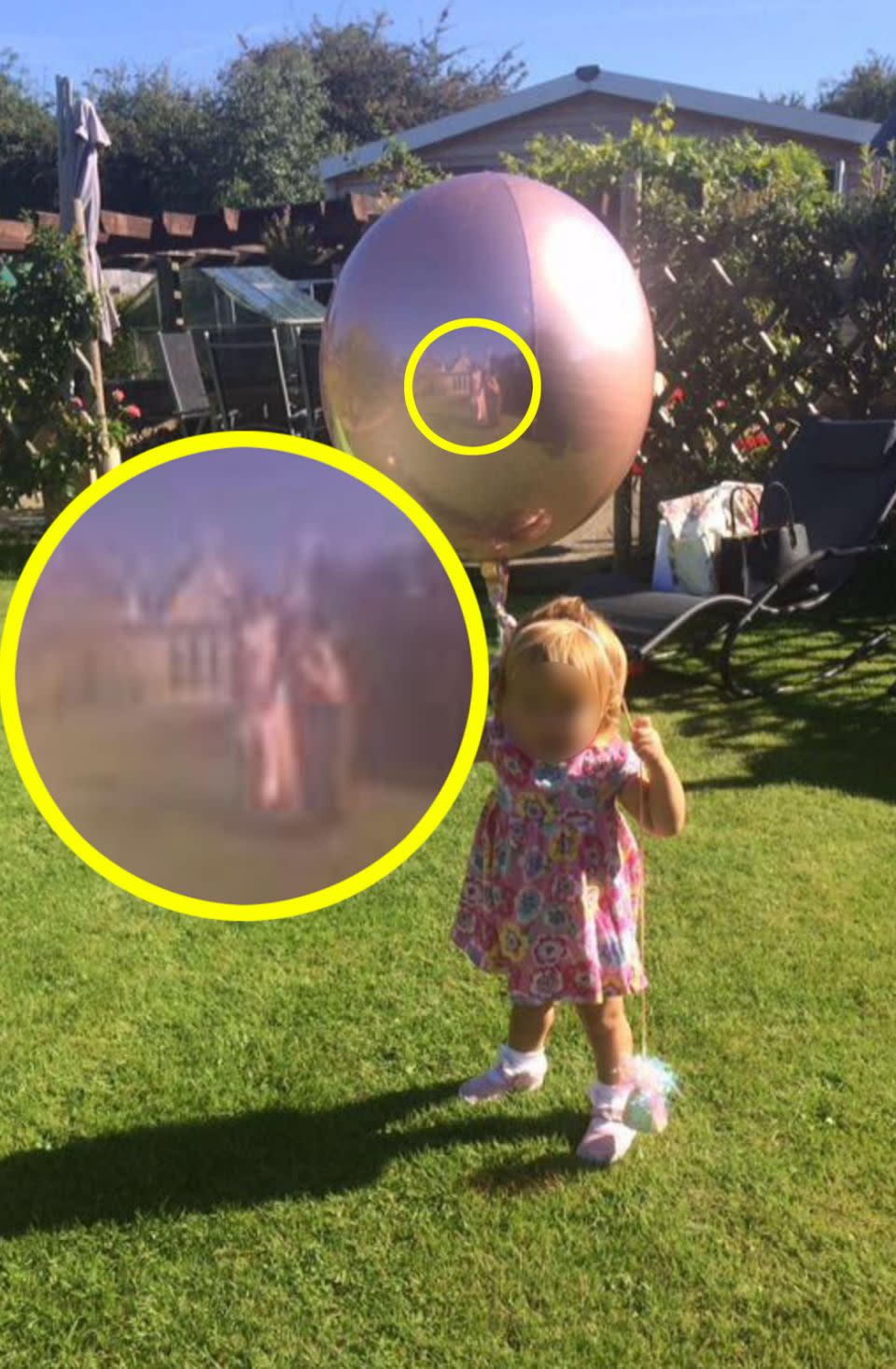 Then suddenly a another figure appeared next to Alice's reflection in the balloon. Photo: Caters News