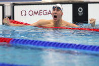 Chase Kalisz, of the United States, celebrates winning the final of the men's 400-meter individual medley at the 2020 Summer Olympics, Sunday, July 25, 2021, in Tokyo, Japan. (AP Photo/Martin Meissner)