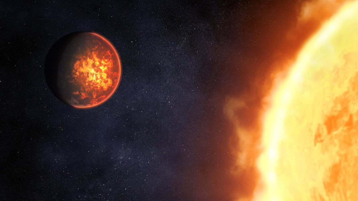  A fiery planet hovers near an enormous fiery star. 