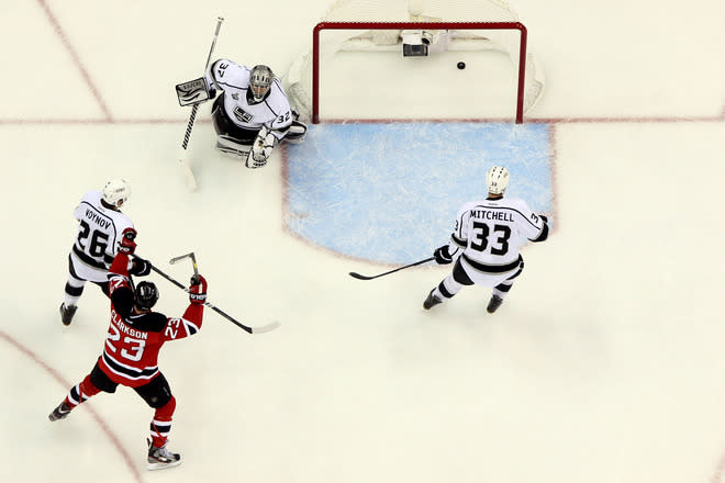 NEWARK, NJ - JUNE 09: David Clarkson #23 of the New Jersey Devils celebrates as Bryce Salvador #24 (not pictured) scores in the second period against Jonathan Quick #32 of the Los Angeles Kings during Game Five of the 2012 NHL Stanley Cup Final at the Prudential Center on June 9, 2012 in Newark, New Jersey. (Photo by Jim McIsaac/Getty Images)