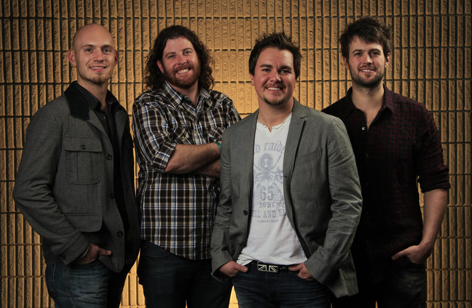 This Feb. 22, 2012, photo shows the Eli Young Band, from left, Jon Jones, James Young, Mike Eli and Chris Thompson in Nashville, Tenn. "Crazy Girl" is up for song, single and vocal group of the year at the ACM Awards, which air live Sunday on CBS. The nominations are acknowledgment of a decade of hard work as the band grew from a partnership between two roommates at the University of North Texas to a tight, ambitious outfit that relentlessly toured and grew its fan base one show at a time. (AP Photo/Mark Humphrey)