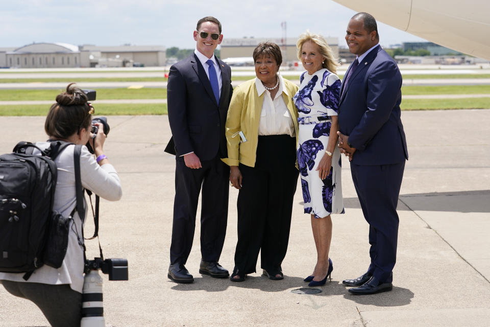 First lady Jill Biden poses for a photo with Dallas Mayor Eric Johnson, right, Rep. Eddie Bernice Johnson, D-Texas, second from left, and Dallas County Judge Clay Jenkins as she arrives at Love Field Airport in Dallas, Tuesday, June 29, 2021. (AP Photo/Carolyn Kaster, Pool)