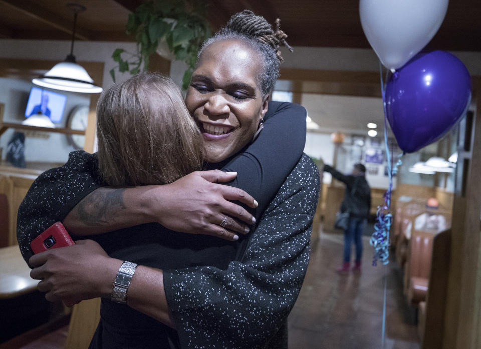 Andrea Jenkins hugs a supporter on Tuesday. (Photo: Carlos Gonzalez/Star Tribune via AP)