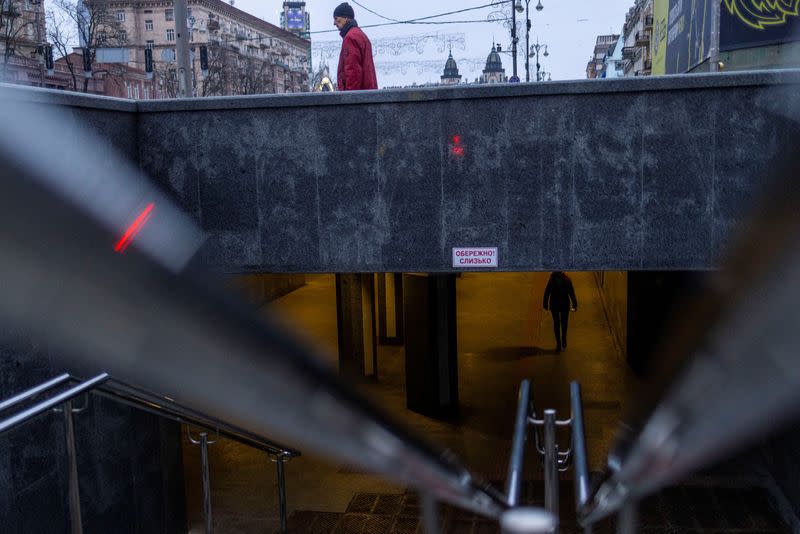 A local resident walks through an underpass in downtown Kyiv