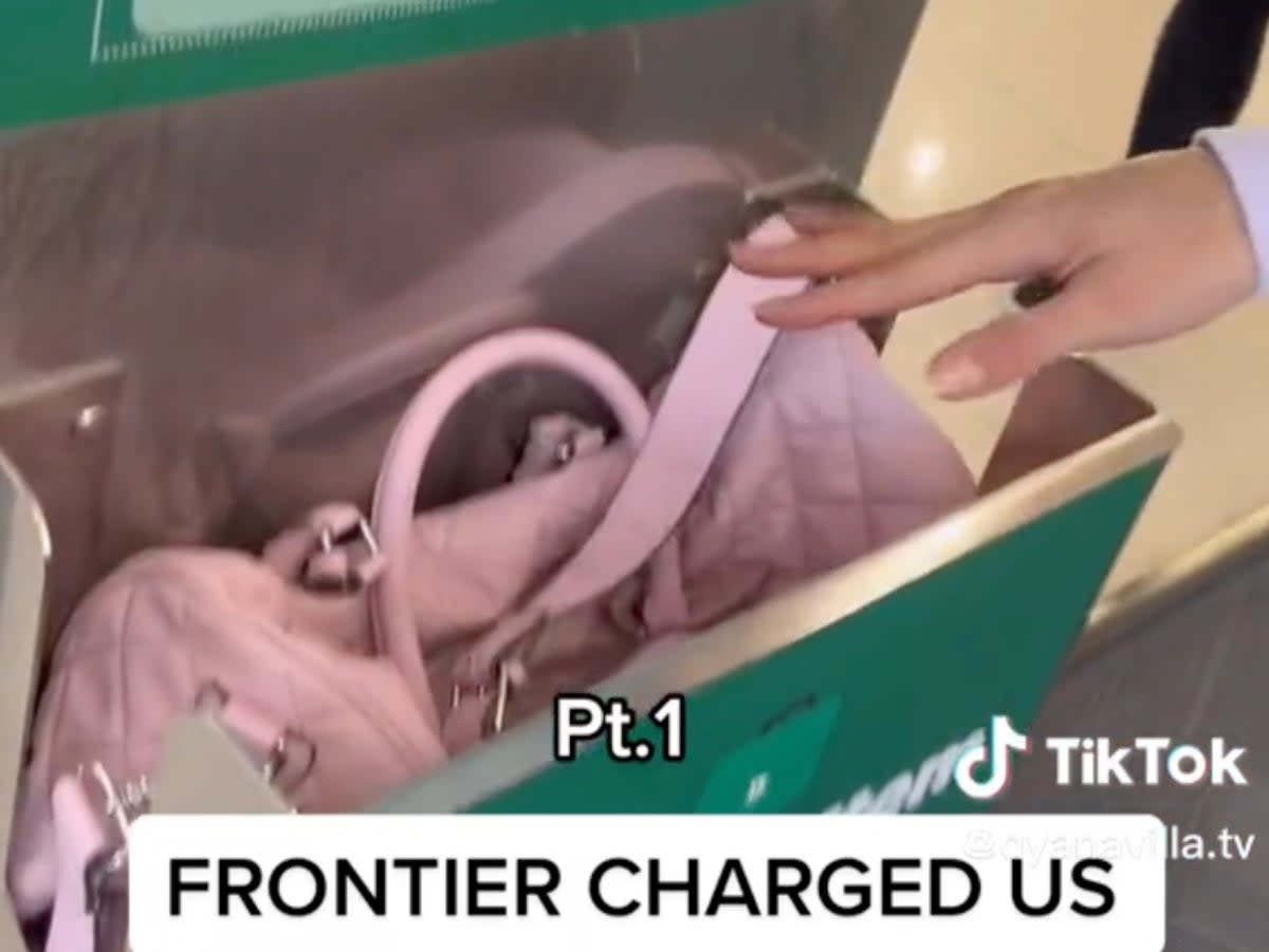 The passenger’s bag in the Frontier Airlines luggage sizer (https://www.tiktok.com/@dyanavilla.tv)