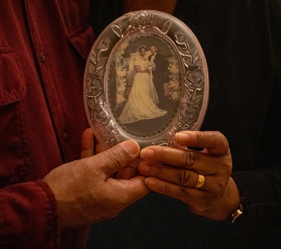 A wedding photo is seen in February of Kelly McGhee, 60, left, and Frank McGhee, 59. The McGhees lost many mementos and other items of personal value as well as faced damage to their water heater, washer and dryer due to flooding.