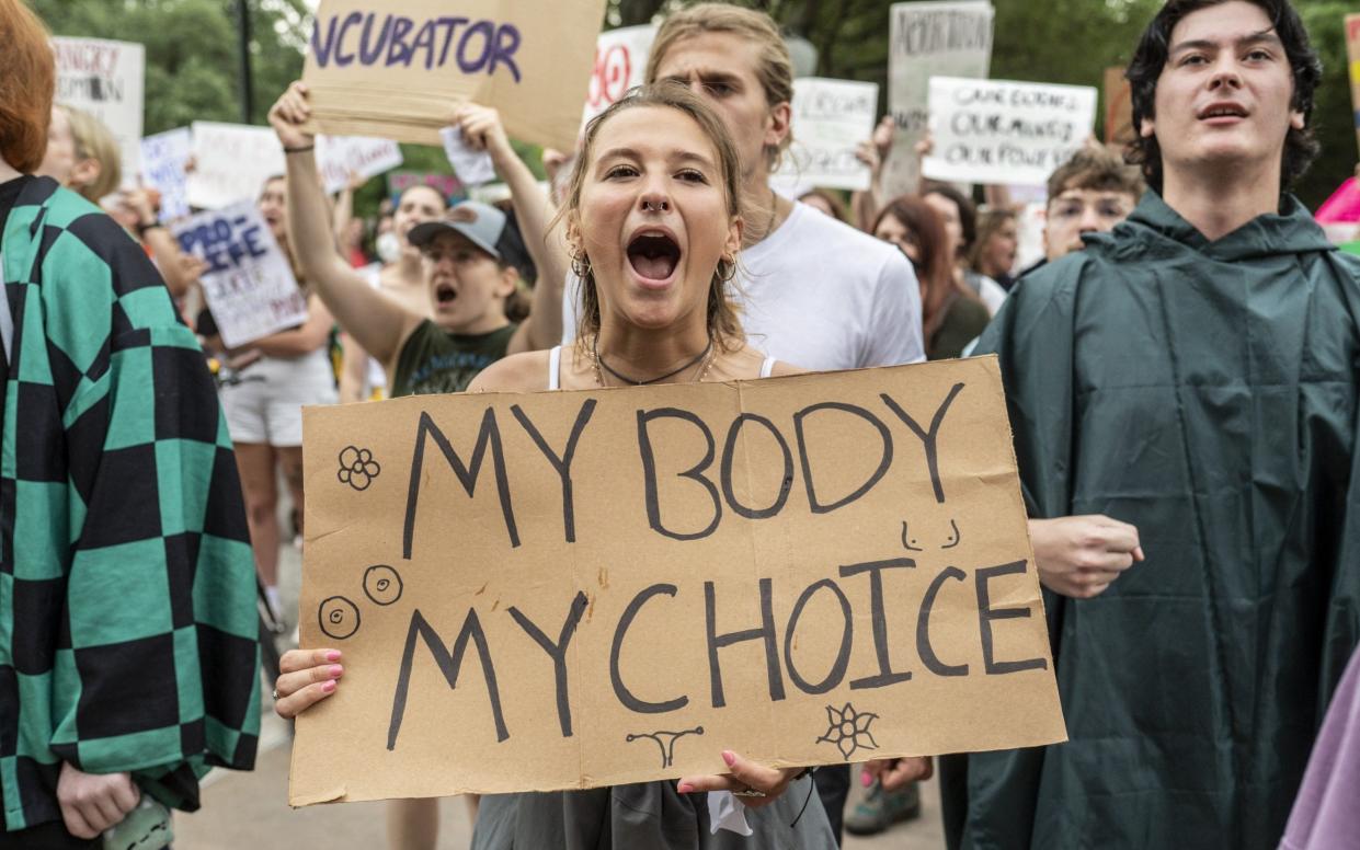 Roe v Wade demonstrators during a national walk out in support of abortion rights at the University of Texas - Sergio Flores/Bloomberg