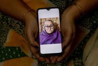 The Wider Image: Indians share the stories of loved ones they lost to the pandemic