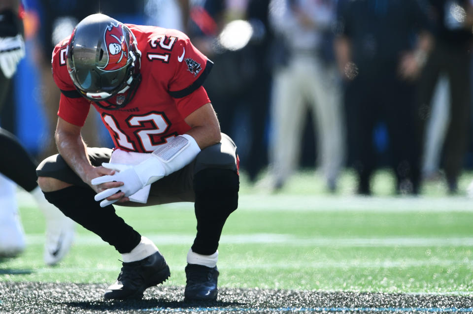 CHARLOTTE, NORTH CAROLINA - OCTOBER 23: Tom Brady #12 of the Tampa Bay Buccaneers reacts after throwing an incomplete third down pass during an NFL game against the Carolina Panthers in the first quarter at Bank of America Stadium on October 23, 2022 in Charlotte, North Carolina. (Photo by Eakin Howard/Getty Images)