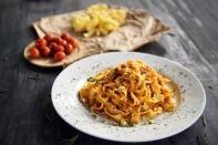 <p>Whether you know it as meat sauce or ragu, making traditional bolognese can be a challenge. According to L'Accademia Italiana della Cucina in Italy, this recipe for traditional bolognese ragu is the right way to make the sauce. Wondering what <a href="https://www.thedailymeal.com/cook/ultimate-guide-pasta-shapes-gallery?referrer=yahoo&category=beauty_food&include_utm=1&utm_medium=referral&utm_source=yahoo&utm_campaign=feed" rel="nofollow noopener" target="_blank" data-ylk="slk:pasta shape;elm:context_link;itc:0;sec:content-canvas" class="link ">pasta shape</a> you should add to your bolognese? Don’t stray far from tagliatelle or other wide, long noodles—the only shape allowed, according to some purists.</p> <p><a href="https://www.thedailymeal.com/rag-alla-bolognese?referrer=yahoo&category=beauty_food&include_utm=1&utm_medium=referral&utm_source=yahoo&utm_campaign=feed" rel="nofollow noopener" target="_blank" data-ylk="slk:For the Bolognese Ragu recipe, click here.;elm:context_link;itc:0;sec:content-canvas" class="link ">For the Bolognese Ragu recipe, click here.</a></p>