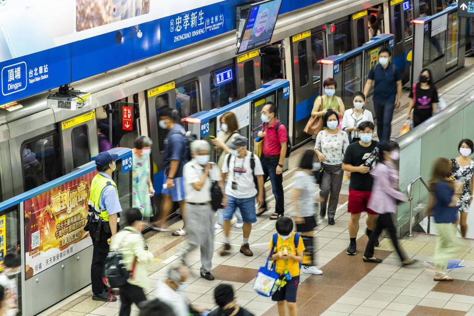 Taipei, Taiwan- August 27, 2021: Commuters are shuttled inside the Zhongxiao Xinsheng Station of the Taipei MRT in Taiwan. This is the time when the traffic is heavy