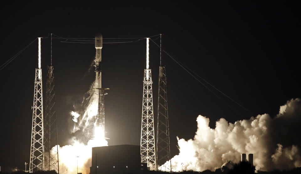A Falcon 9 SpaceX rocket, with a payload of 60 satellites for SpaceX's Starlink broadband network, lifts off from Space Launch Complex 40 at the Cape Canaveral Air Force Station in Cape Canaveral, Fla., Thursday, May 23, 2019. (AP Photo/John Raoux)