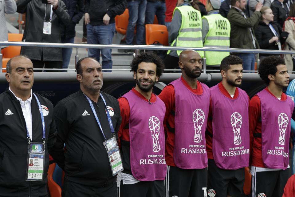 <p>Biding his time: Salah stands for the Egyptian national anthem before kick off at the Ekaterinburg Arena. (AP) </p>