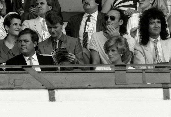 David Bowie, Brian May and Diana, Princess of Wales in the audience at Live Aid (Rex)