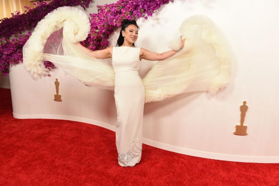 Ashley Yi arrives for the 96th Academy Awards.