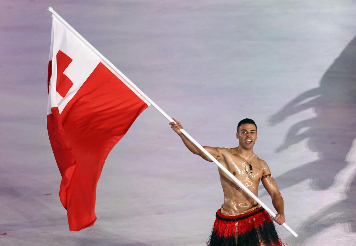 Pita Taufatofua was Tonga’s flag bearer at the 2016 Summer Olympics and the 2018 Winter Olympics. (Getty)
