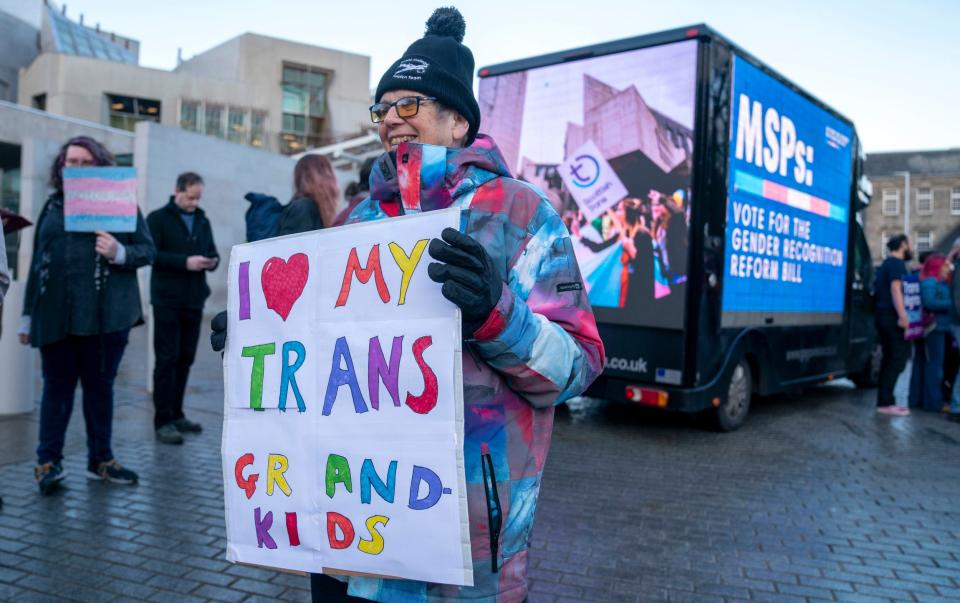 Supporters of the transgender reforms for which MSPs will have a final vote on Wednesday - Jane Barlow/PA