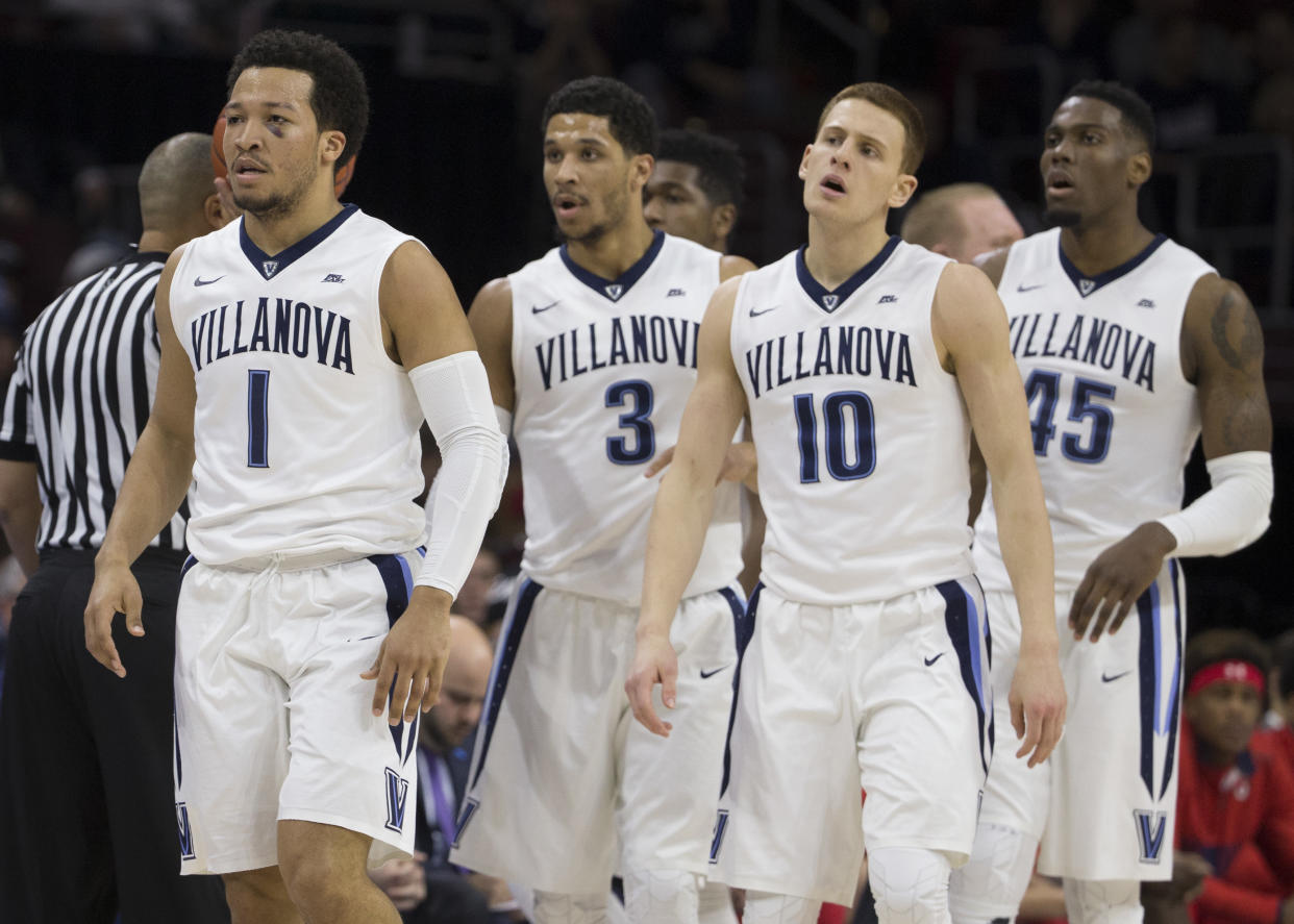 PHILADELPHIA, PA - FEBRUARY 4: Jalen Brunson #1, Josh Hart #3, Donte DiVincenzo #10, and Darryl Reynolds #45 of the Villanova Wildcats play against the St. John's Red Storm at the Wells Fargo Center on February 4, 2017 in Philadelphia, Pennsylvania. The Wildcats defeated the Red Storm 92-79. (Photo by Mitchell Leff/Getty Images)
