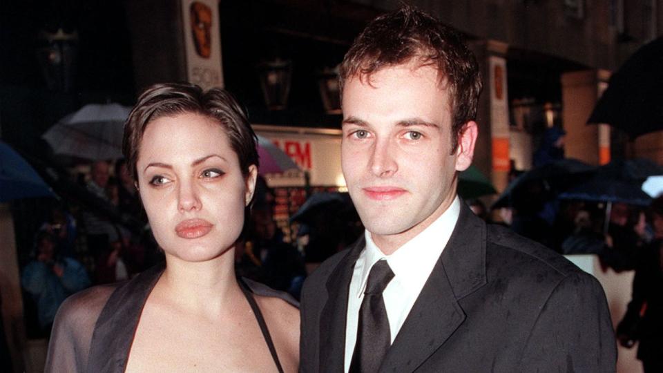 Johnny Lee Miller and Angelina Jolie at.  Photo by Andrew Stuart – PA Images/PA Images via Getty Images.