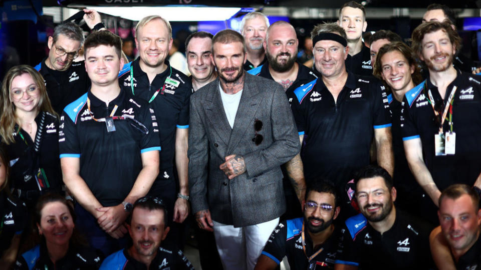 LUSAIL CITY, QATAR - OCTOBER 08: David Beckham poses for a photo with the Alpine F1 team prior to the F1 Grand Prix of Qatar at Lusail International Circuit on October 08, 2023 in Lusail City, Qatar. (Photo by Clive Rose/Getty Images)
