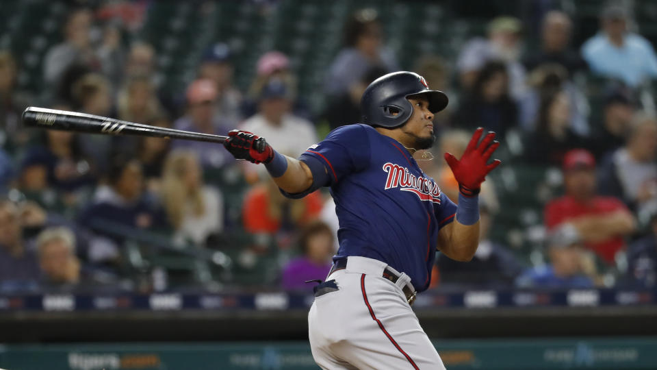 Minnesota Twins' Luis Arraez hits a two-run home run in the seventh inning of a baseball game against the Detroit Tigers in Detroit, Wednesday, Sept. 25, 2019. (AP Photo/Paul Sancya)