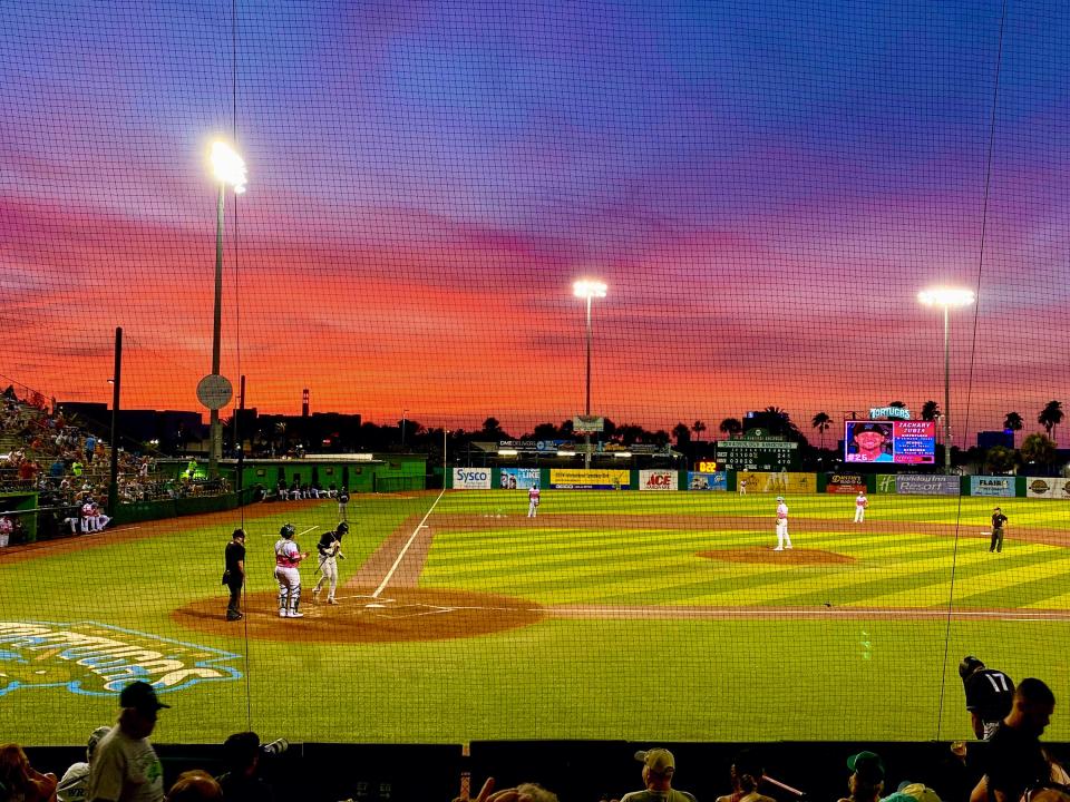 A brilliant sunset over Jackie Robinson Ballpark during the 2022 season.