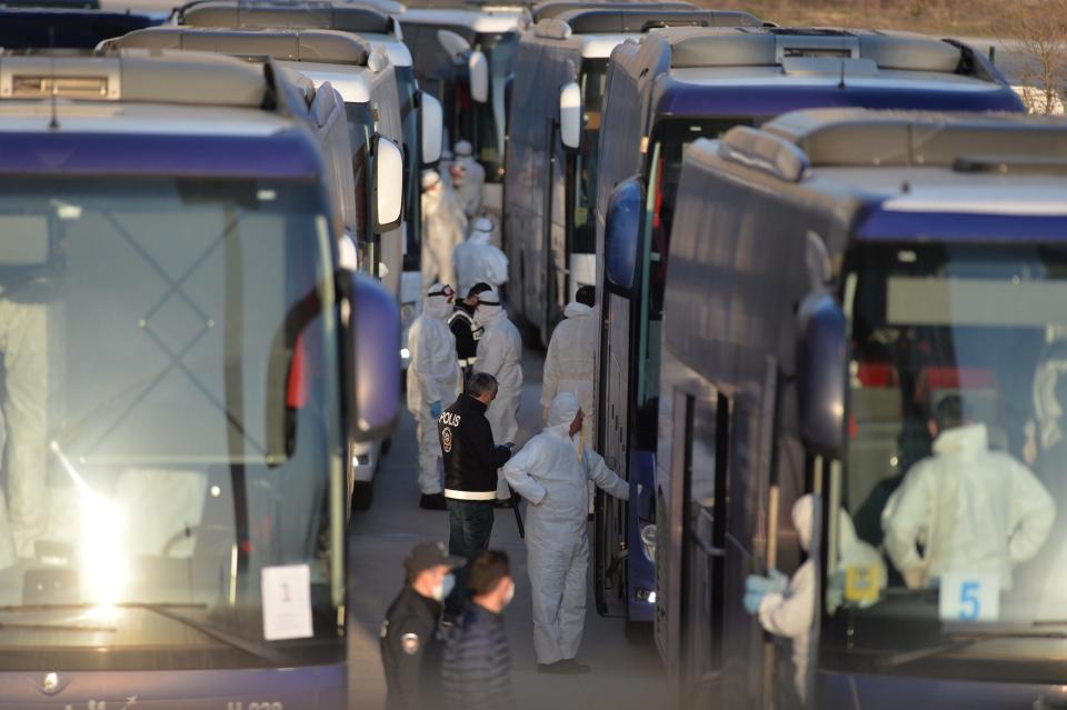 Foreign passengers, including Algerian, Jordanian and Tunisian, who have been waiting at Istanbul Airport, are transported to a dormitory to stay as airspaces were shut down in their countries due to a coronavirus outbreak in Karabuk, Turkey on March 26.