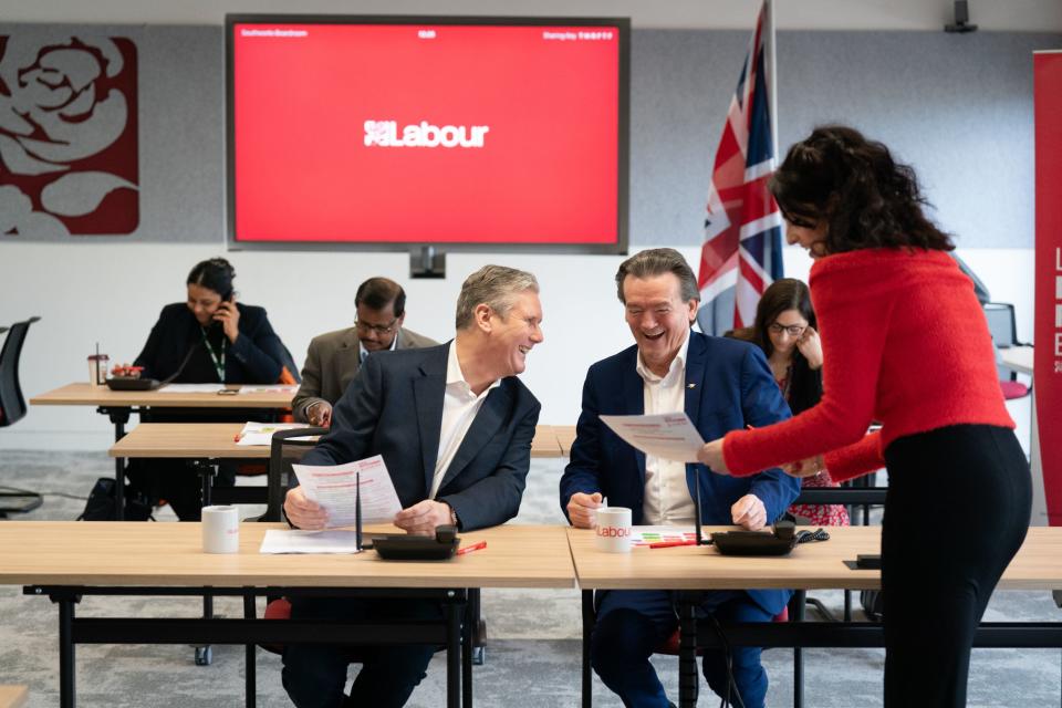 Sir Keir is joined by musician Feargal Sharkey as he canvasses voters by phone for the Wellingborough and Kingswood by-elections (PA)