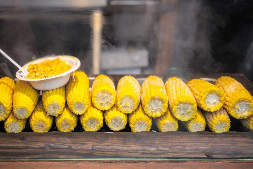 steamed corn on the cob on display at christmas market
