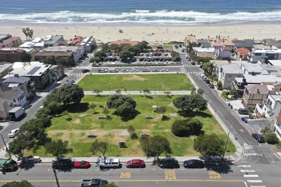 FILE - This April 8, 2021 file photo shows Bruce's Beach in Manhattan Beach, Calif. Los Angeles County leaders took initial steps Tuesday, April 20, 2021, toward returning prime beachfront property to descendants of a Black couple who built a resort for African Americans but were stripped of the land by local city officials a century ago. (Dean Musgrove/The Orange County Register via AP, File)