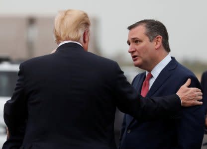 U.S. President Donald Trump greets U.S. Senator Ted Cruz (R-TX) upon arriving at the Ellington Field Joint Reserve Base in Houston, Texas, U.S., October 22, 2018.  REUTERS/Leah Millis