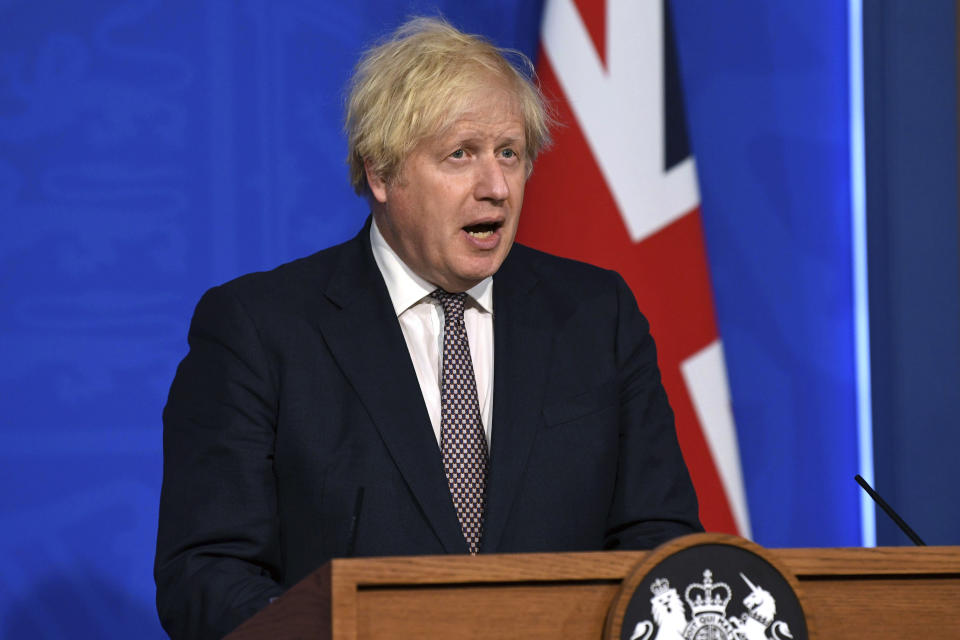 Britain's Prime Minister Boris Johnson speaks during a media briefing on coronavirus in Downing Street, London, Monday, July 5, 2021. Johnson on Monday confirmed plans to lift mask requirements and social distancing rules as planned on July 19 despite a surge in infections. (Daniel Leal-Olivas/Pool Photo via AP)