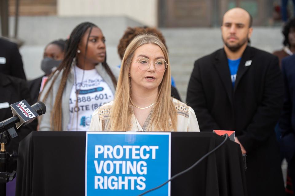 Poll monitor Brittany Denson addresses media regarding events of the Nov. 7 election due to ballot shortages in Hinds County during a news conference in Jackson on Thursday.