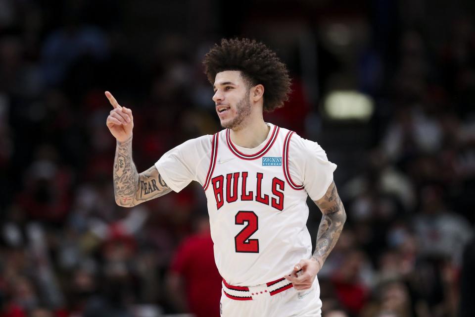 Bulls guard Lonzo Ball smiles after making a three-point-shot during the second half against the Pistons at the United Center on Jan. 11, 2022. (Armando L. Sanchez/Chicago Tribune/Tribune News Service via Getty Images)