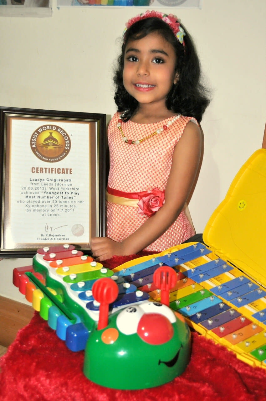 <em>Talented – Laasya has scooped a world record for memorising and playing 50 xylophone songs in under 25 minutes (Pictures: SWNS)</em>