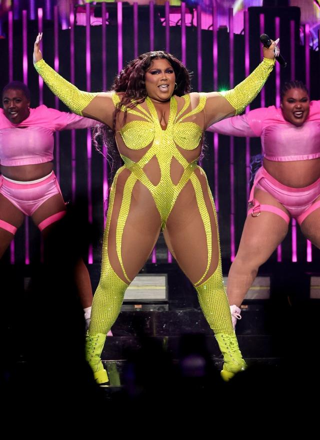 Lizzo Wears Neon and Nude Illusion Catsuit in New York City