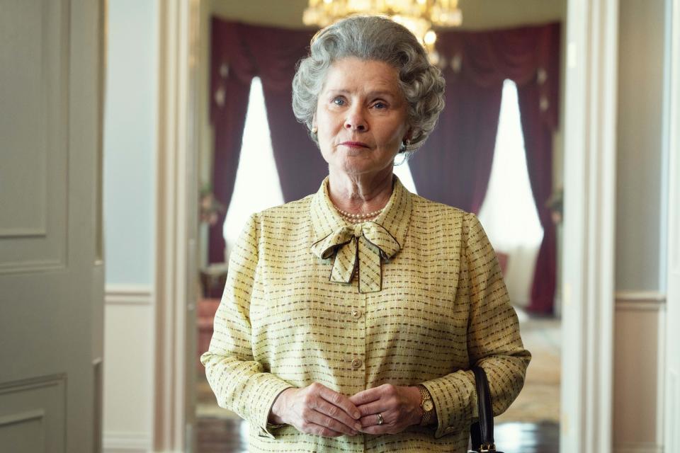 an actor playing Queen Elizabeth in the '90s looking concerned