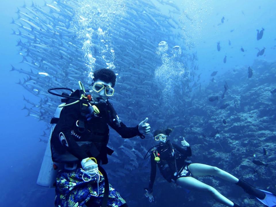 Thompson family scuba diving near Nabucco Island in Borneo, Indonesia