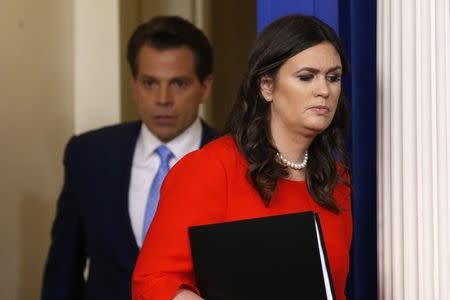 Deputy White House Press Secretary Sarah Sanders and new White House Communications Director Anthony Scaramucci arrive at the daily briefing at the White House in Washington, U.S. July 21, 2017. REUTERS/Jonathan Ernst