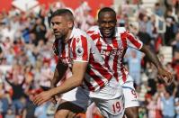 Britain Football Soccer - Stoke City v Liverpool - Premier League - bet365 Stadium - 8/4/17 Stoke City's Jonathan Walters celebrates scoring their first goal with Saido Berahino Reuters / Darren Staples Livepic