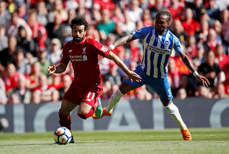 Soccer Football - Premier League - Liverpool vs Brighton & Hove Albion - Anfield, Liverpool, Britain - May 13, 2018 Liverpool's Mohamed Salah in action with Brighton's Gaetan Bong Action Images via Reuters/Carl Recine