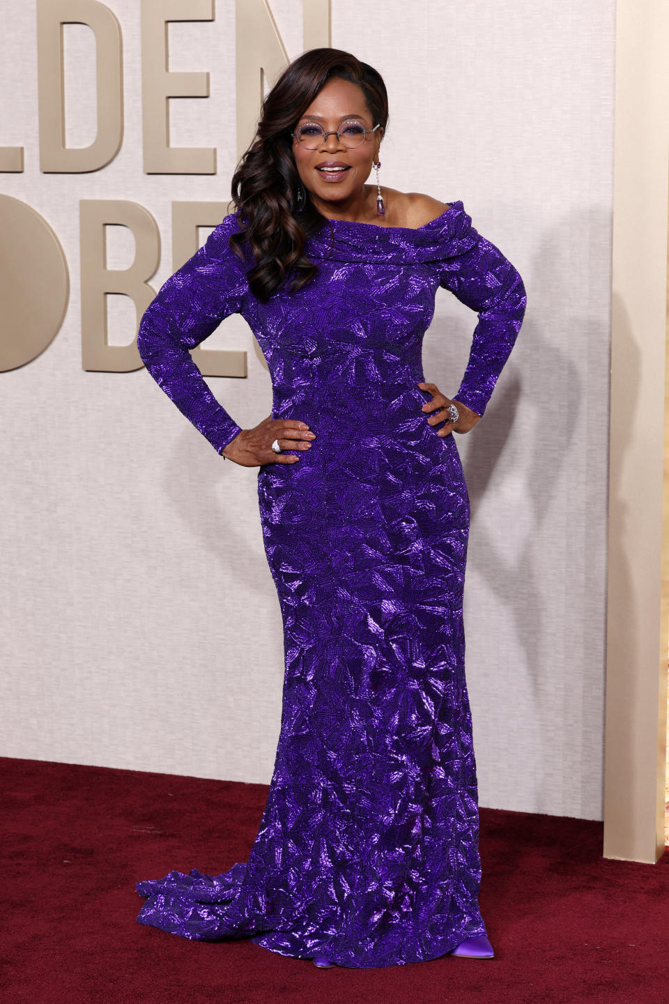 "The Color Purple" producer wore a look befitting the film for the 81st Golden Globe Awards. (Image via Getty Images)