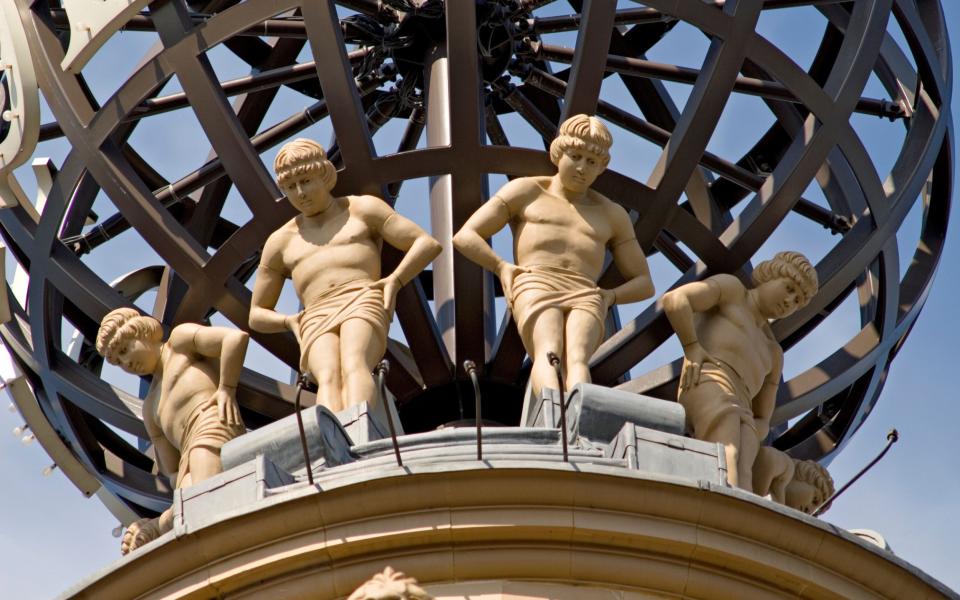 Detail of sculptures on the roof tower of the London Coliseum, home of the English National Opera